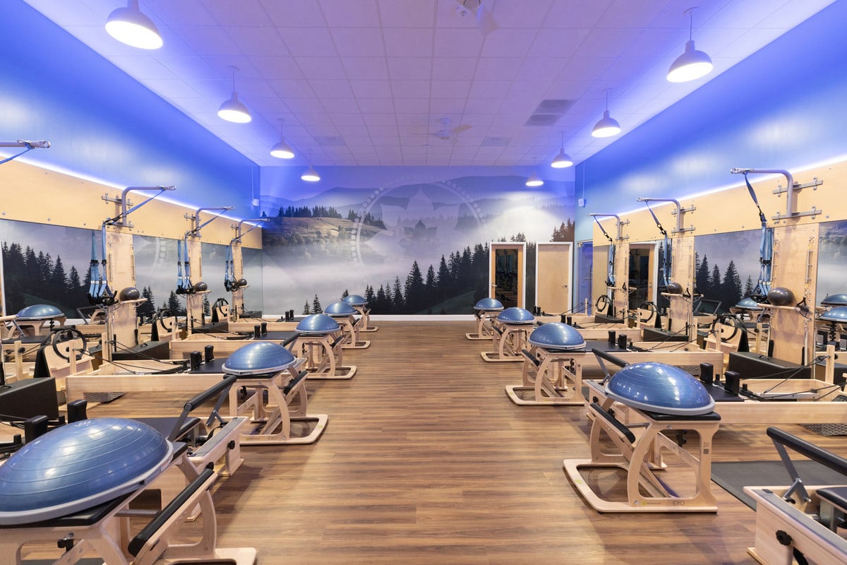 Updated ClubPilates studio interior with reformer pilates machines